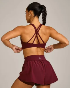 EasyLift™ High Neck Sports Bra with Grey Logo