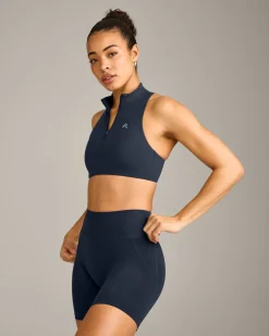 EasyLift™ Zip High Neck Sports Bra with Grey Logo