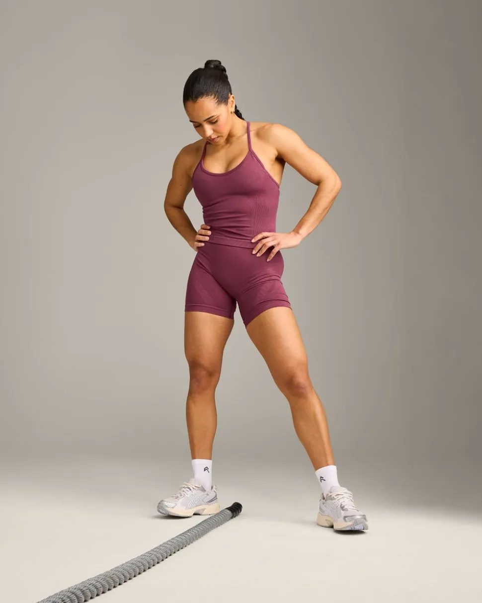 EnhanceLift™ Seamless Strappy Racer Vest with Built in Bra Shelf with Grey Logo