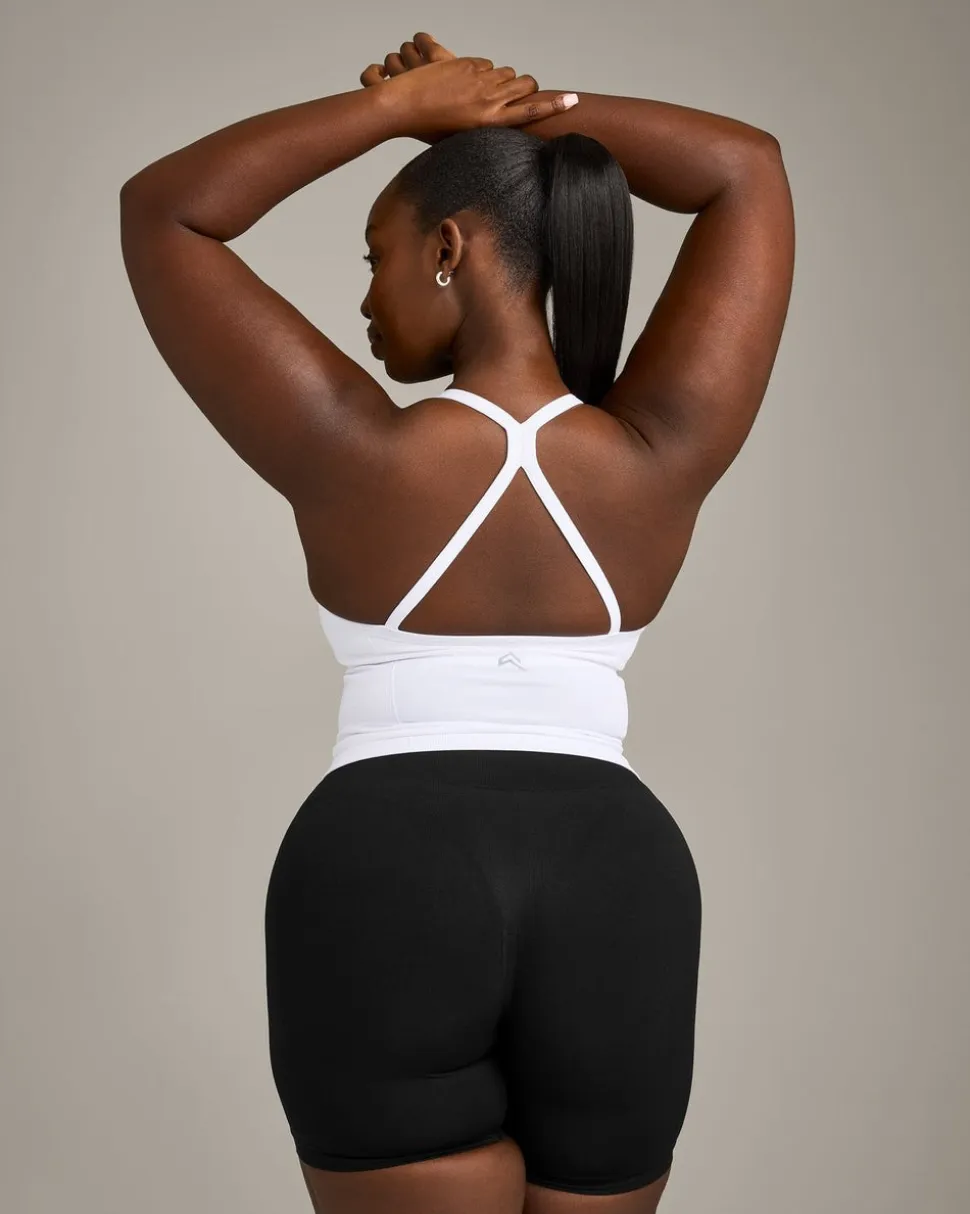 EnhanceLift™ Seamless Strappy Racer Vest with Built in Bra Shelf with Grey Logo