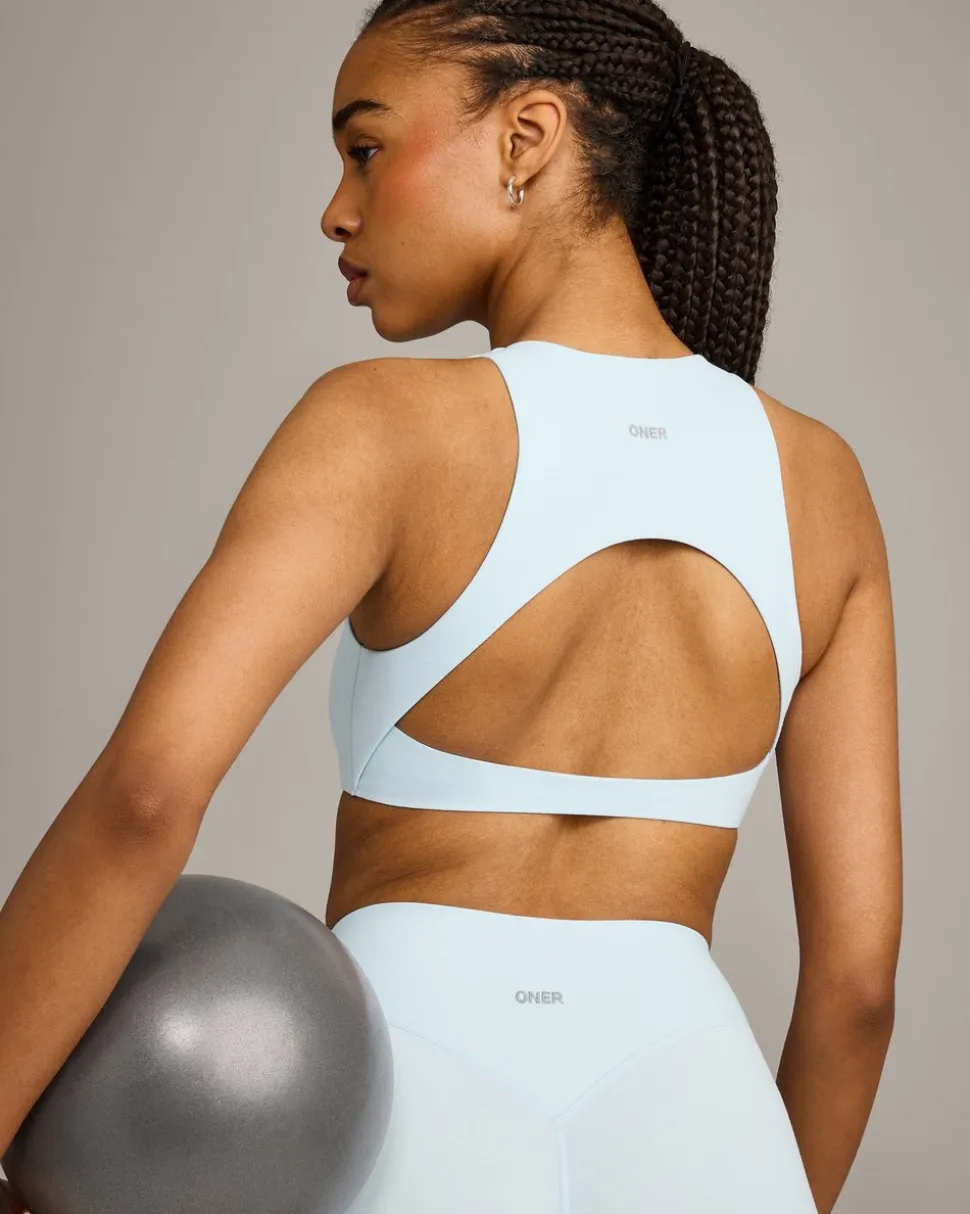 SoftMotion™ High Neck Sports Bra with Grey Logo