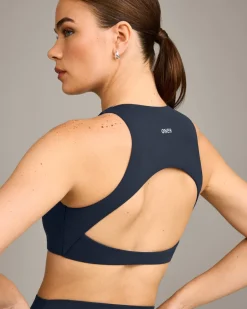 SoftMotion™ High Neck Sports Bra with Grey Logo