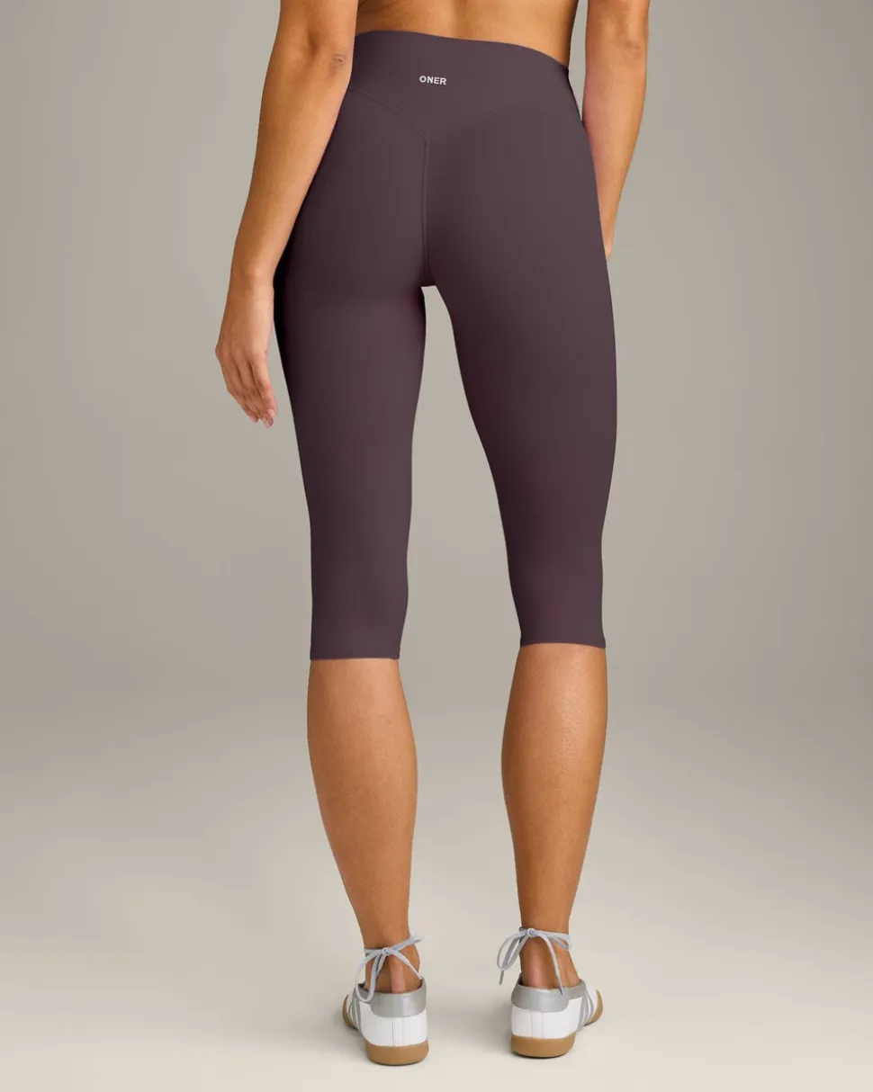 SoftMotion™ High Waisted Capri Leggings with Grey Logo