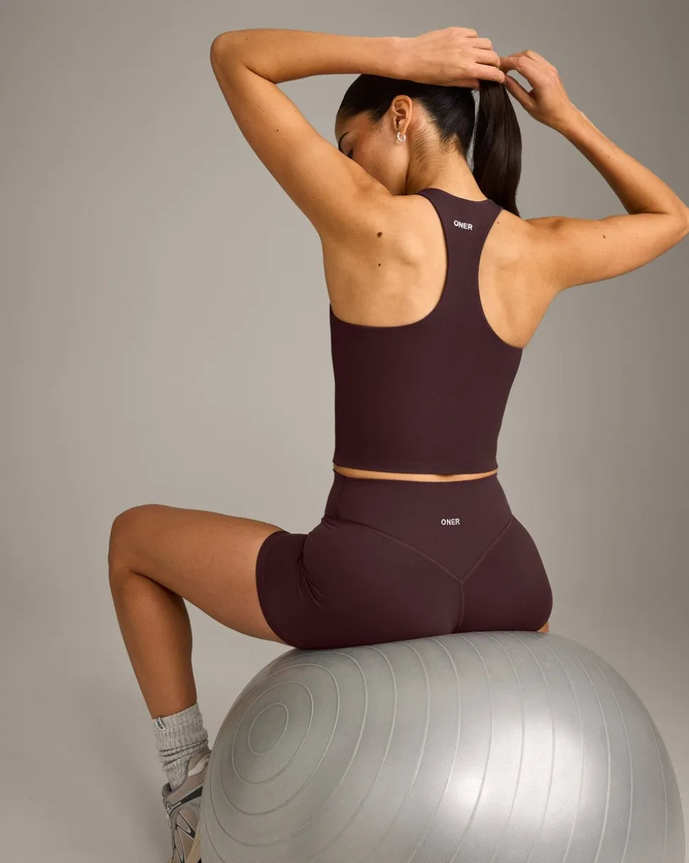 SoftMotion™ Racer Back Mid Vest with Built in Bra Shelf with Grey Logo