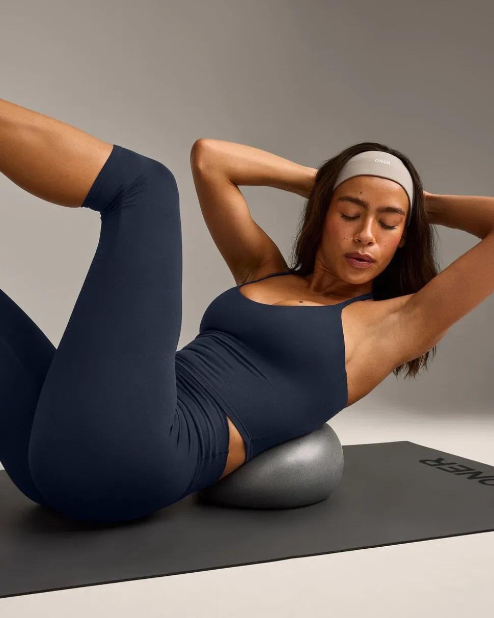 SoftMotion™ Strappy Halter Neck Mid Vest with Built in Bra Shelf with Grey Logo