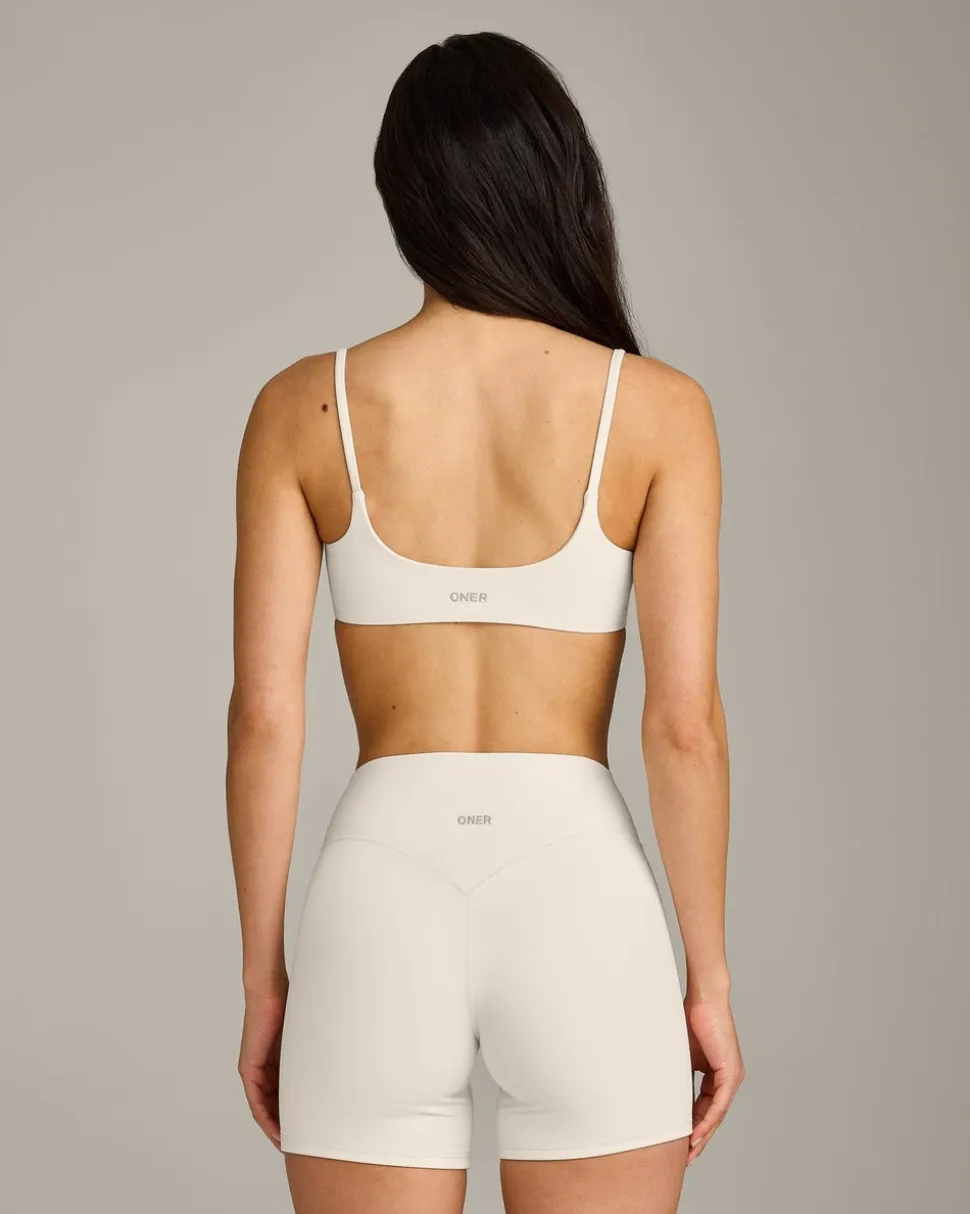 SoftMotion™ Strappy Sports Bra with Grey Logo