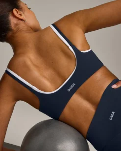 SoftMotion™ Strappy Sports Bra with Grey Logo
